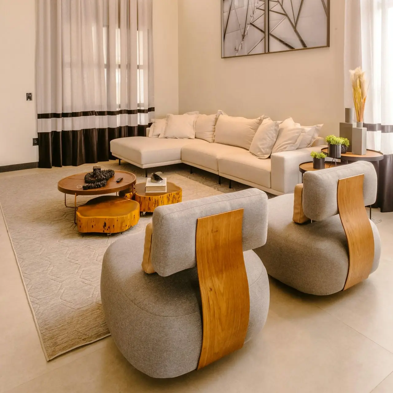 a living room with a couch a chair and a table
